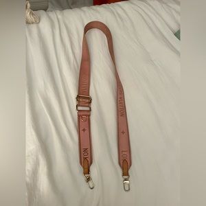 Du** of the LV pink strap for purse